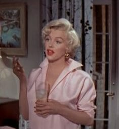 Marilyn Monroe in a pink blouse