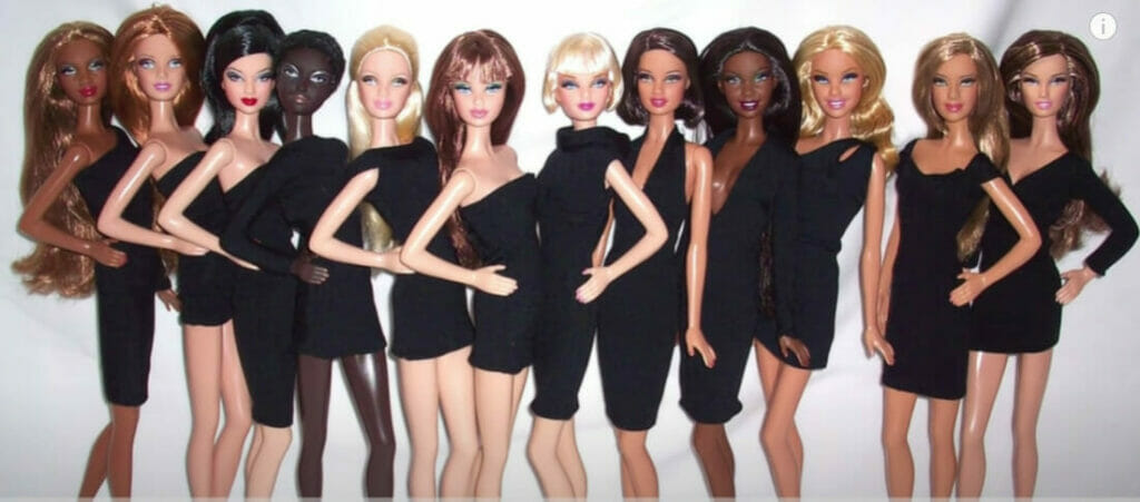 12 barbie dolls all in black ensembles