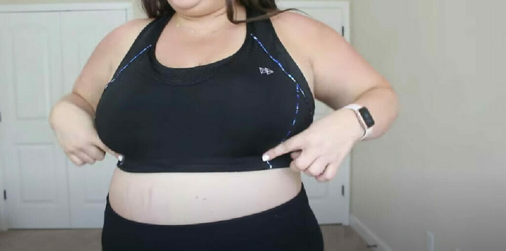 plus-size woman wearing a sports bra