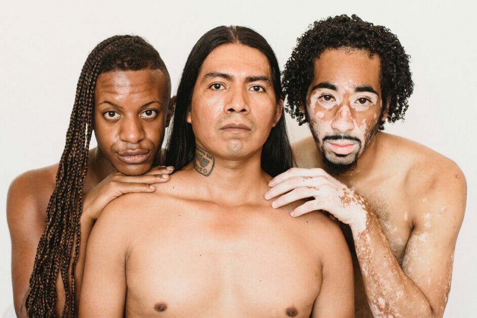 three men posing top naked