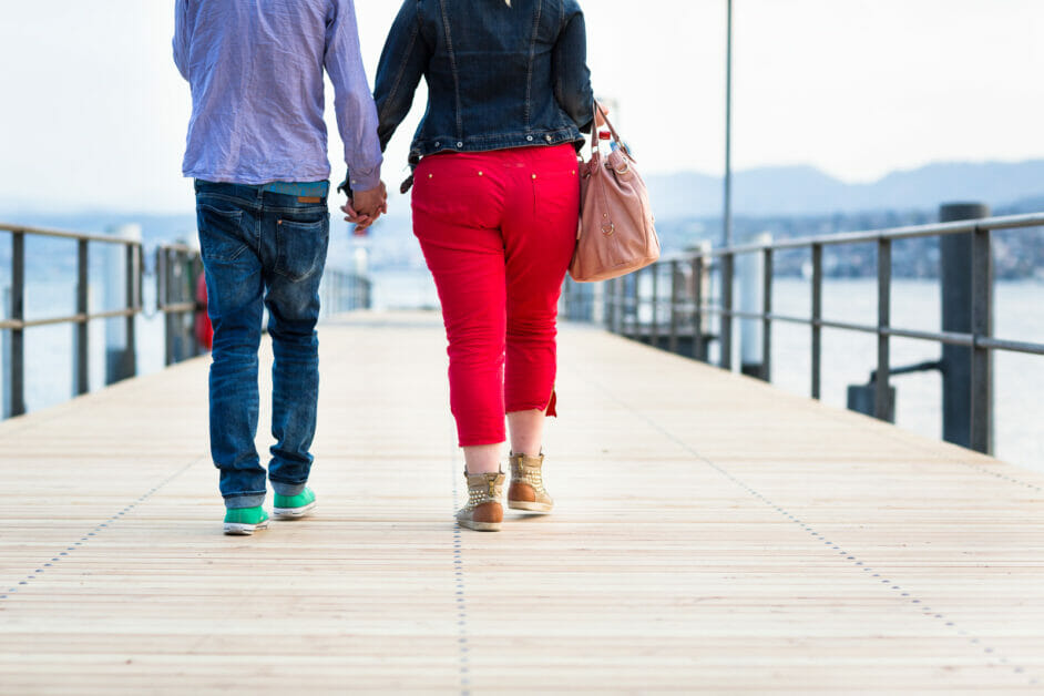 couple walking in the baywalk